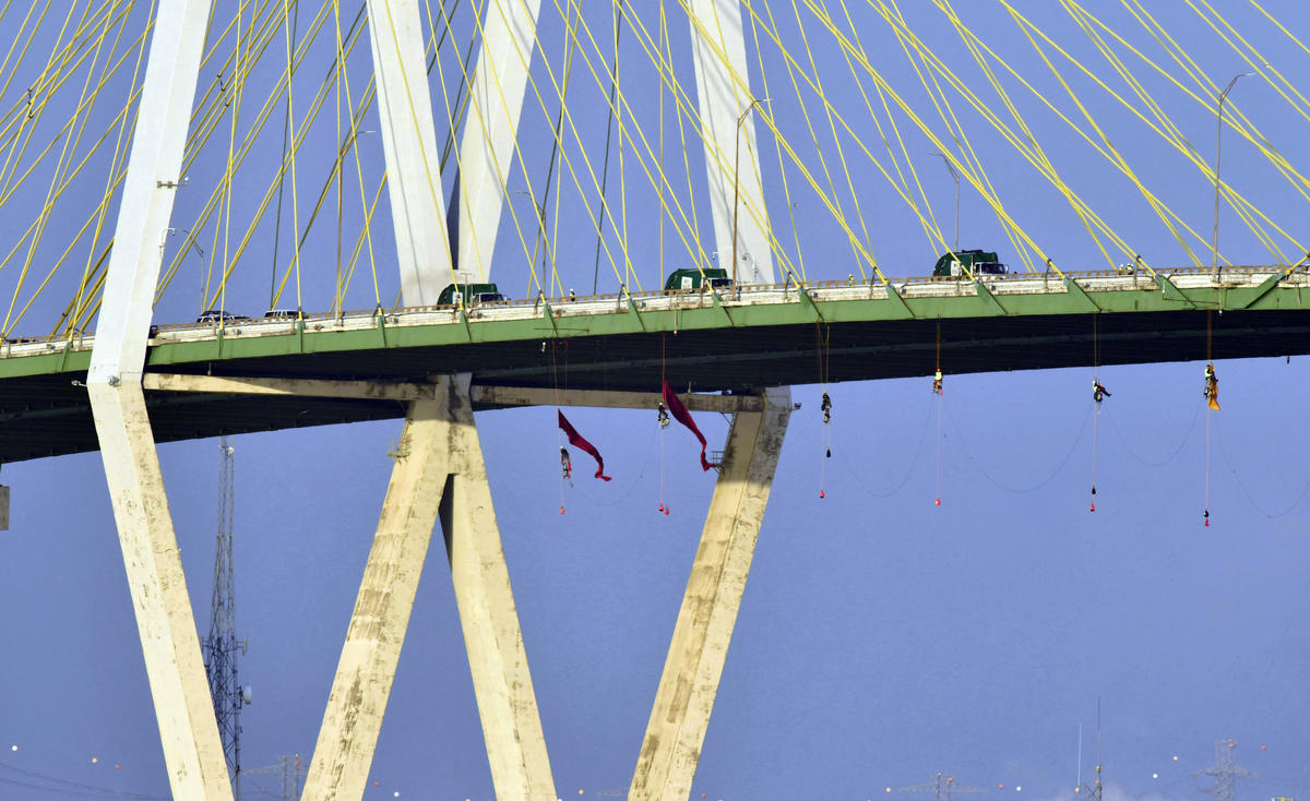 Greenpeace climbers block busiest oil export channel in United States