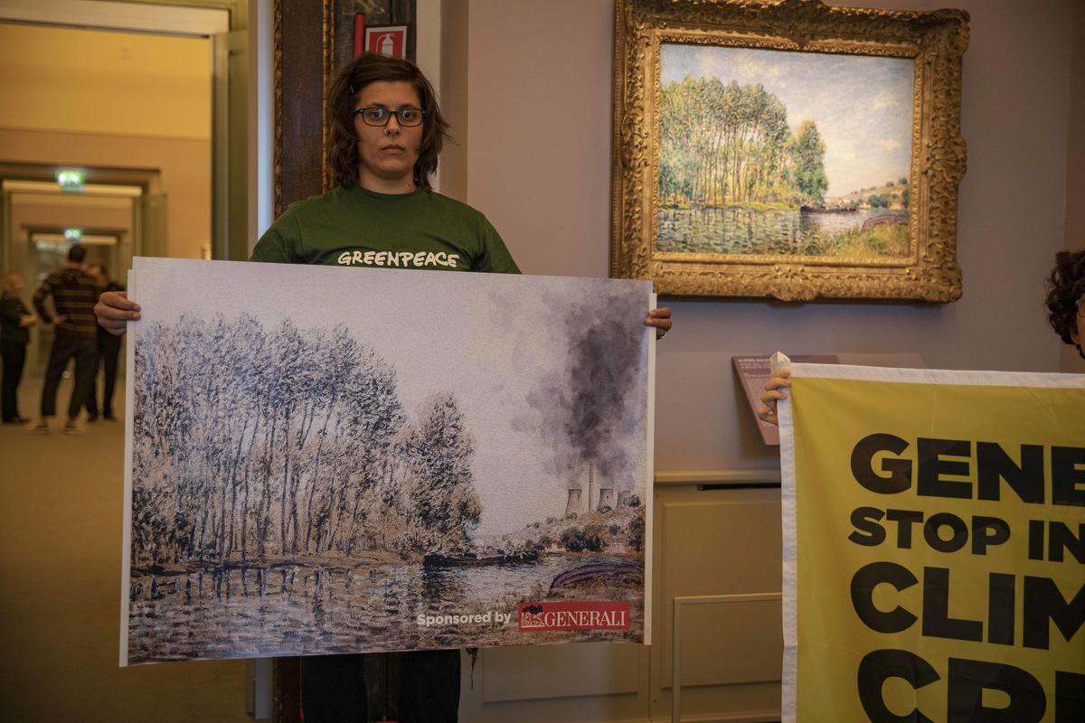 Greenpeace turns exhibition sponsored by EU’s 3rd largest insurer into climate intervention
