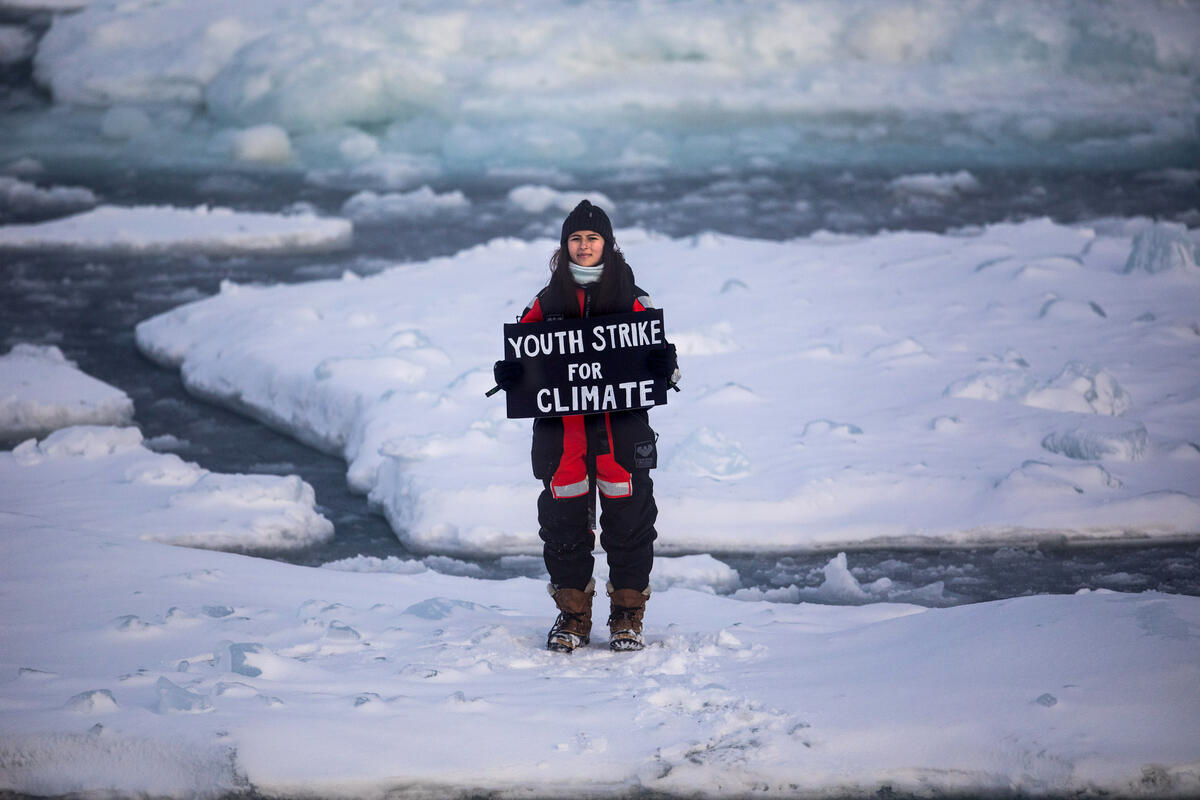 Bird prodigy and young activist leader holds most Northerly strike