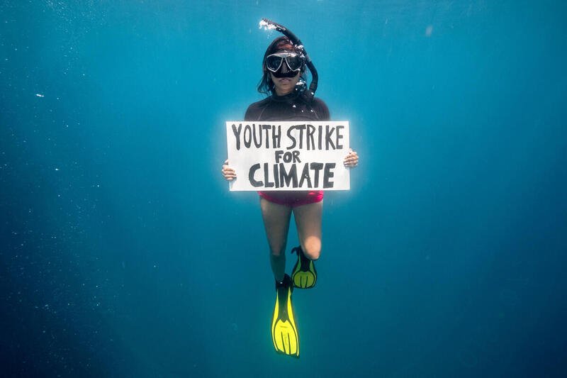 World’s first underwater climate strike calls for ocean protection