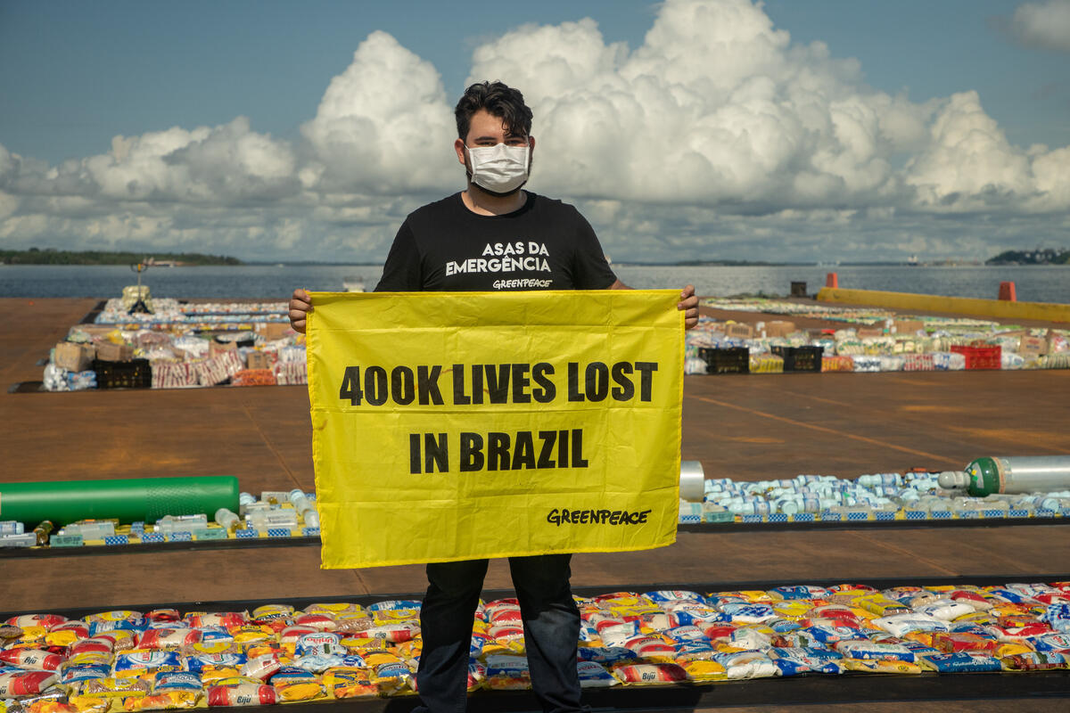 Activists use COVID relief supplies to mark enormous death toll in Brazil