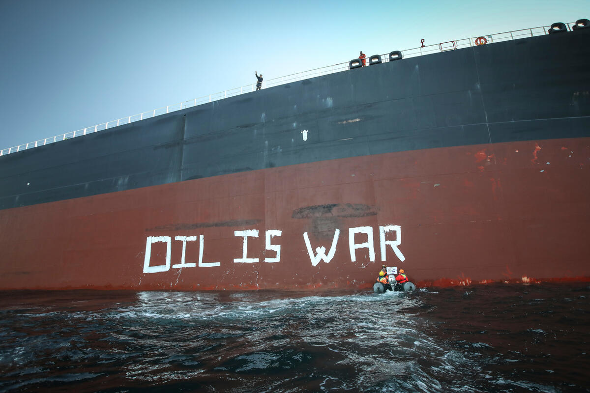 Greenpeace activists protest in front of supertanker – demanding that EU ban Russian oil