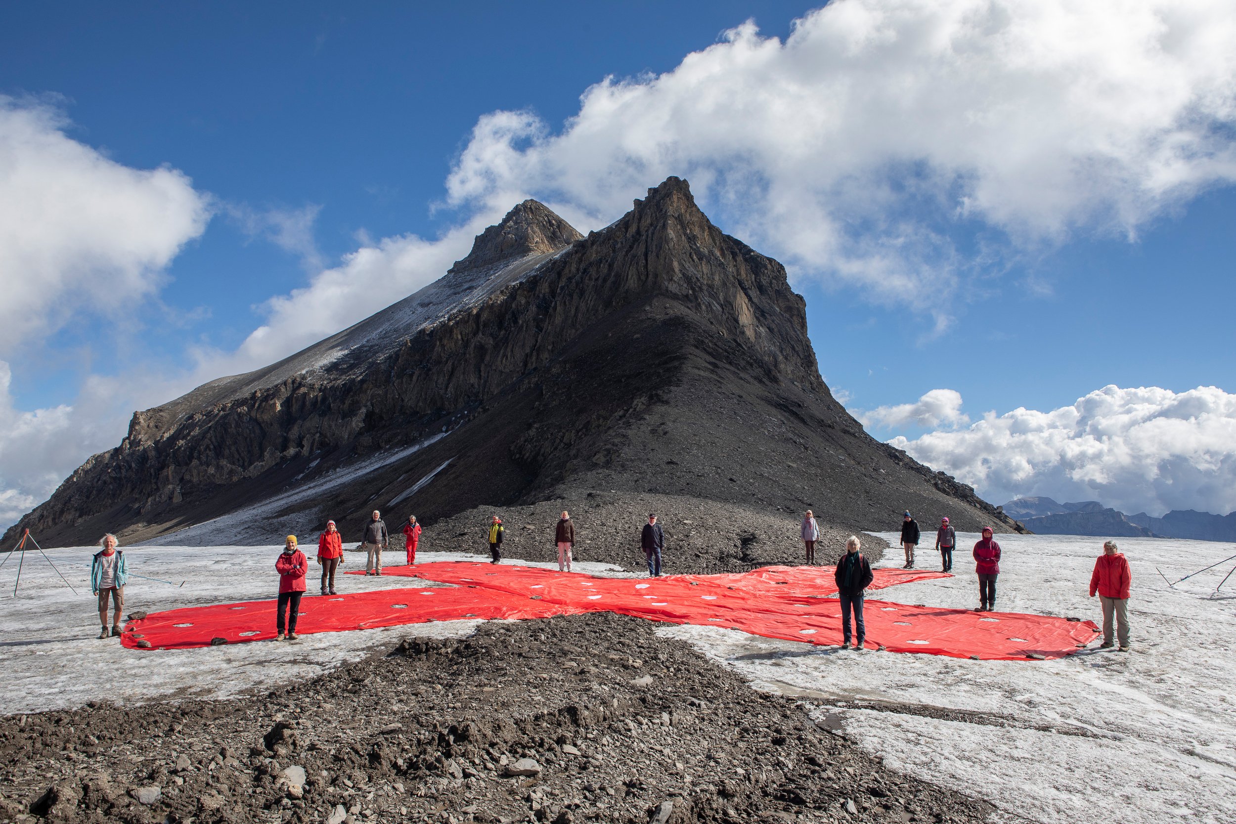 Senior women protest at melting Swiss glaciers to highlight climate urgency, ahead of court case - Greenpeace International