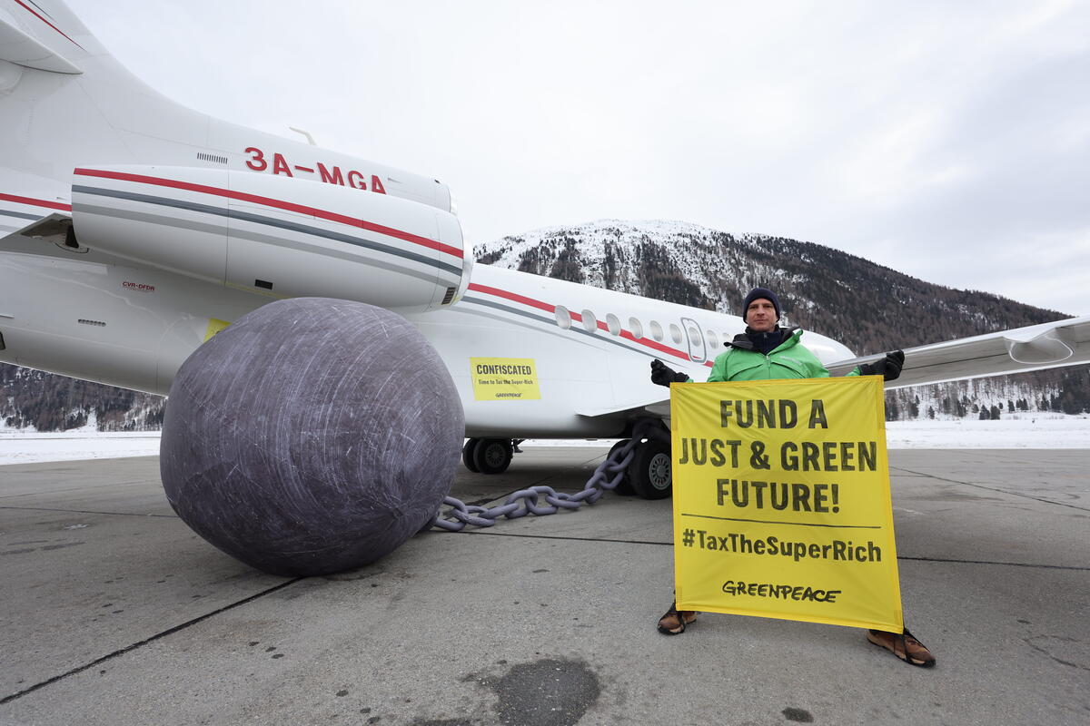 Greenpeace activists ‘confiscate’ private jets at the airport serving WEF in Davos, urge governments to tax the super-rich